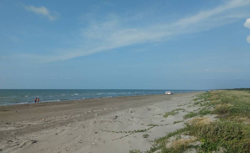 Photo de Playa El Pirata avec sable beige de surface