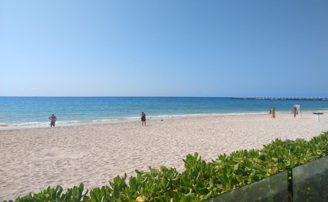 Photo de Playa Mamitas avec sable beige fin de surface