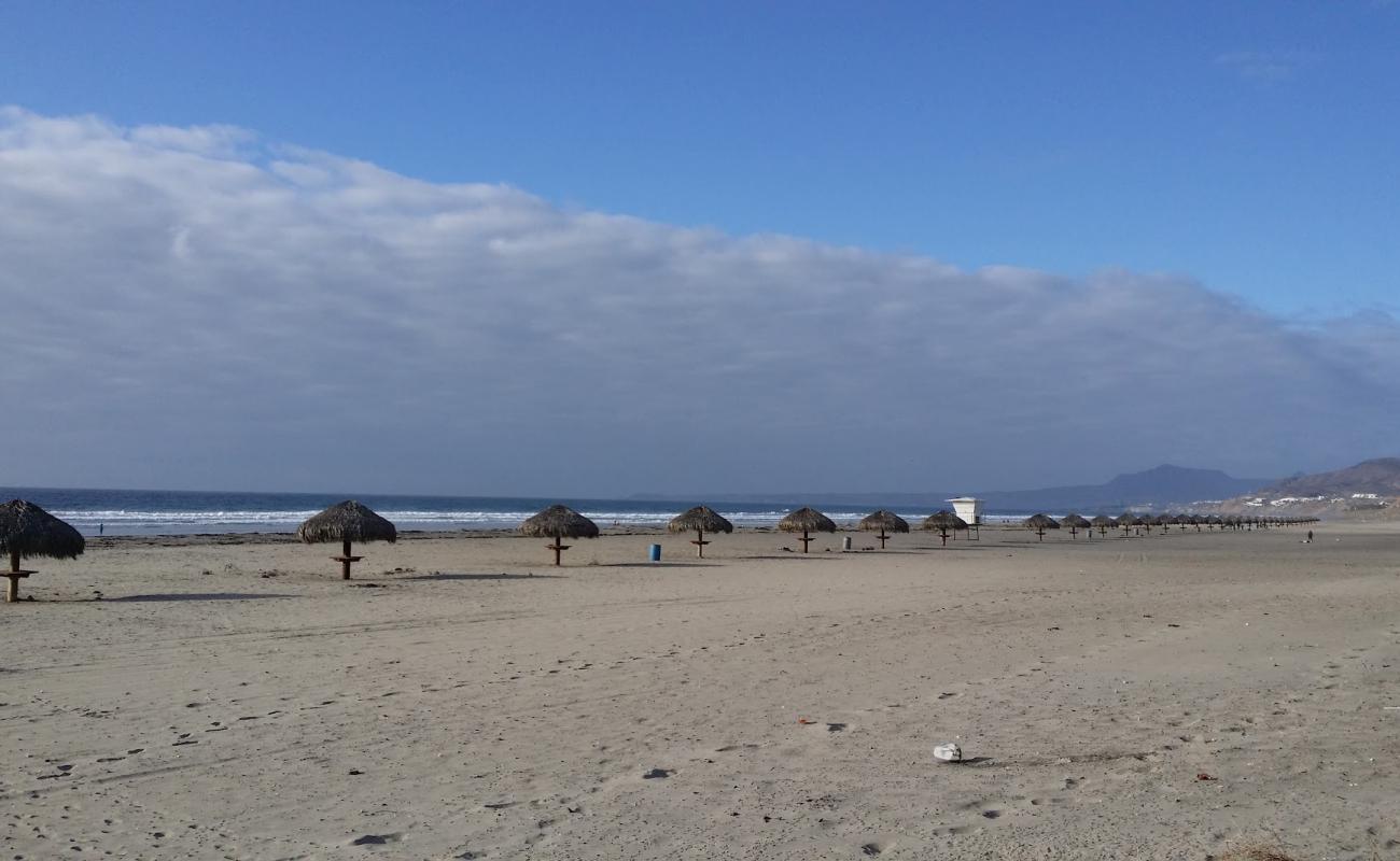 Photo de Playa la Mision avec sable brun de surface
