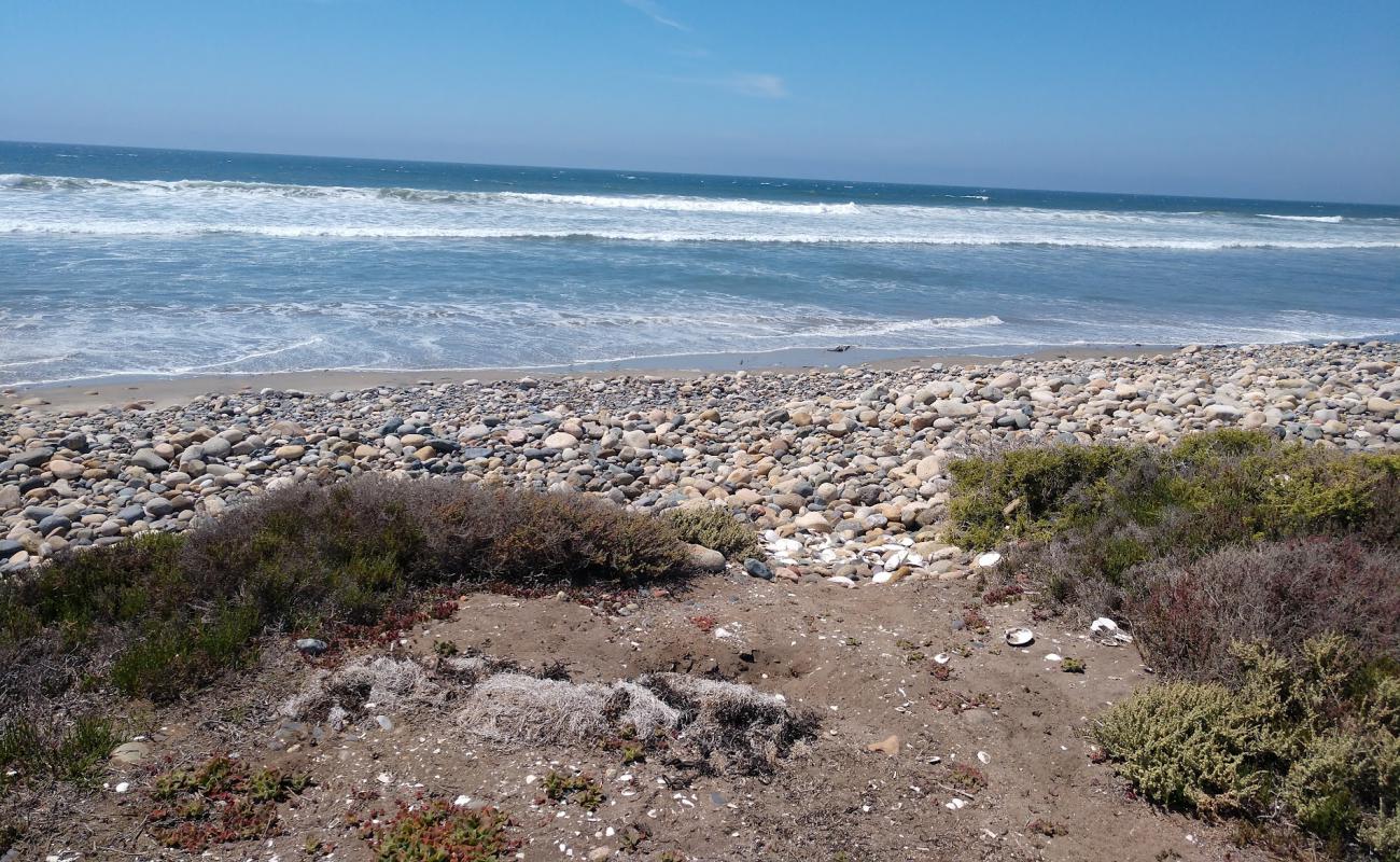 Photo de Playa El Socorrito avec sable noir & galets de surface