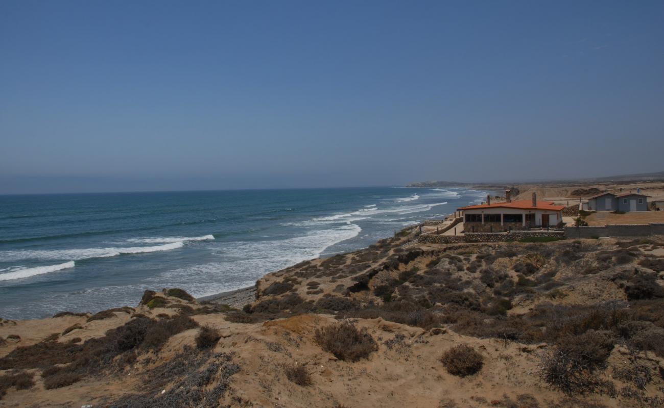 Photo de Playa Valle Tranquilo avec sable noir avec caillou de surface