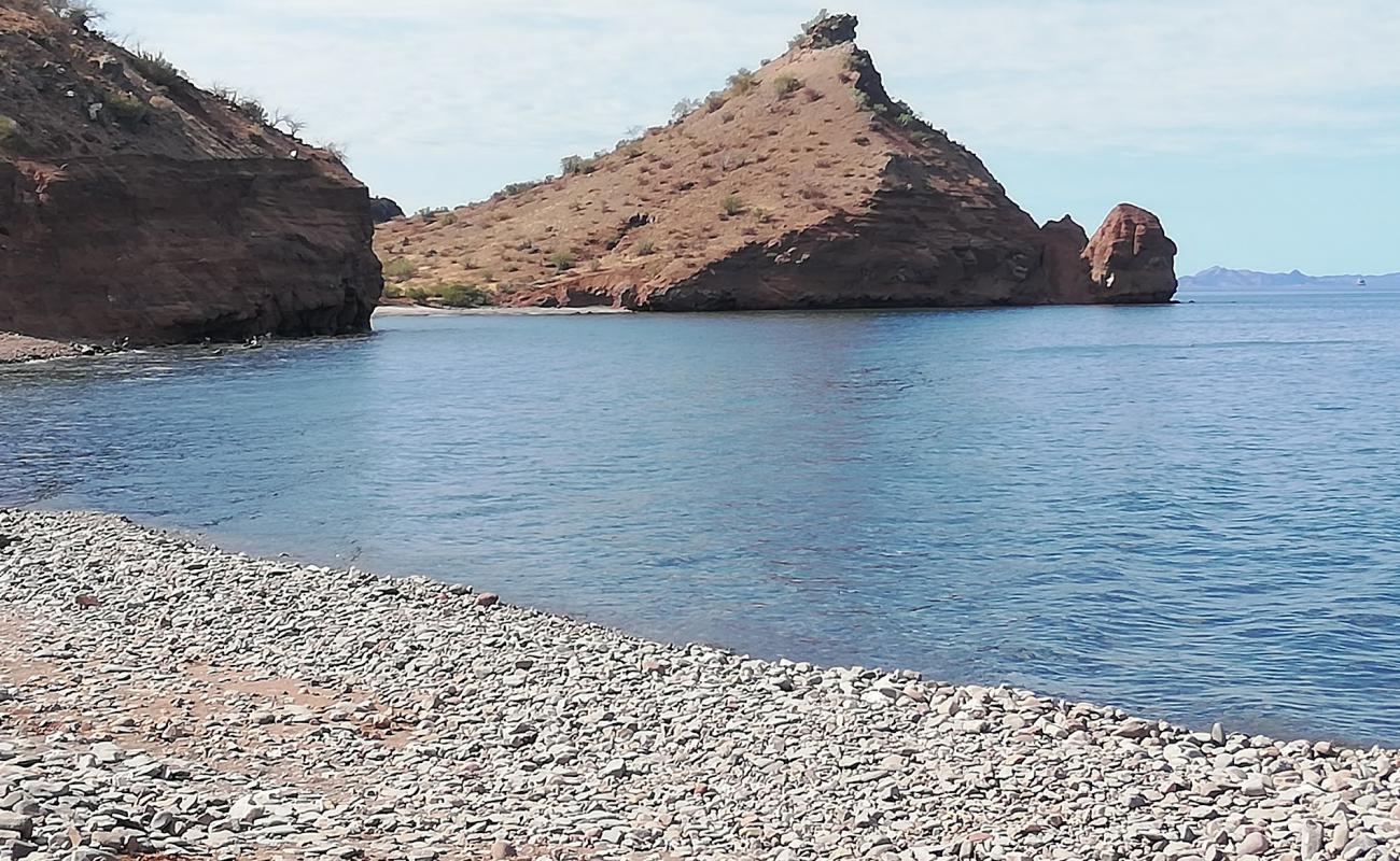 Photo de Playa San Cosme avec galets gris de surface