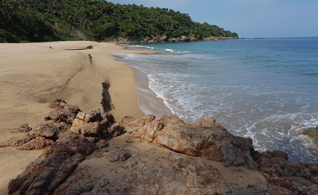 Photo de Barro beach avec sable beige fin de surface