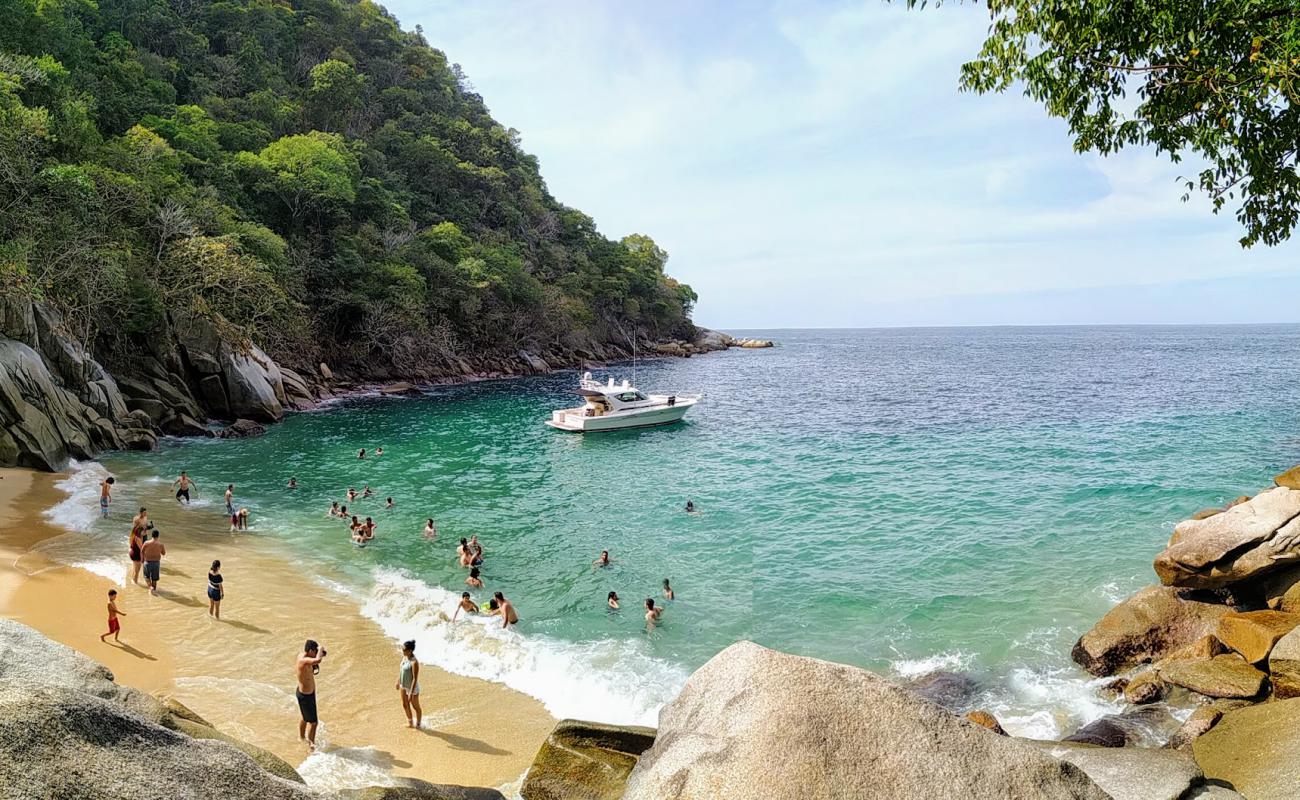 Photo de Colomitos beach avec sable fin et lumineux de surface