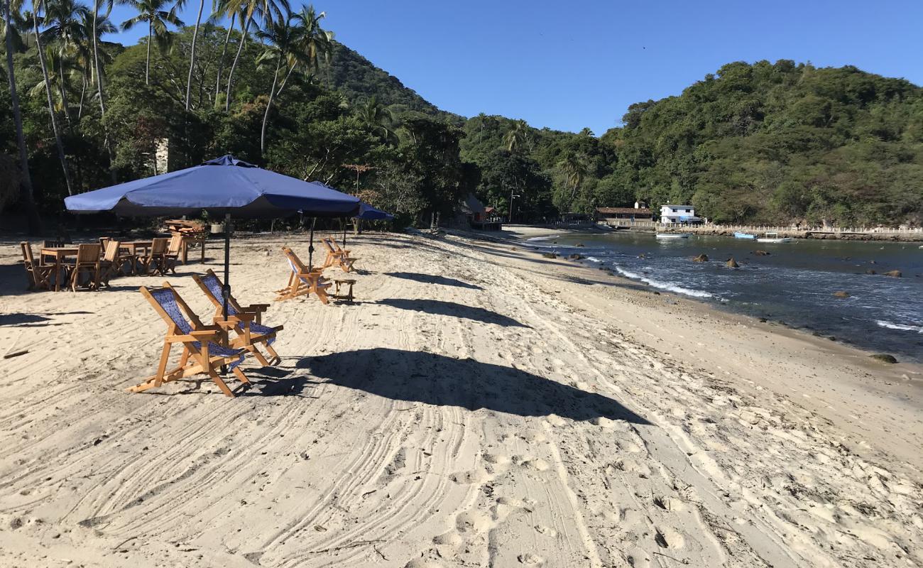 Photo de Quimixto beach I avec sable beige de surface