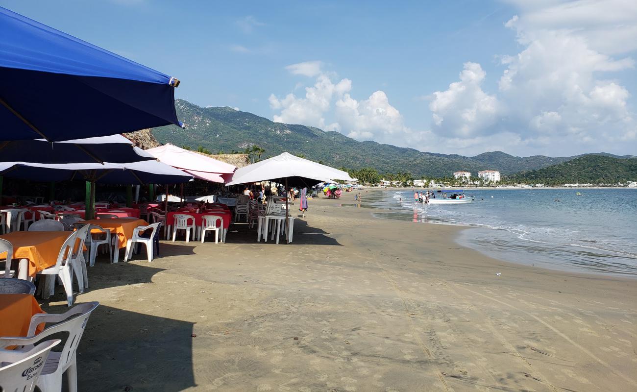 Photo de Playa La Boquita avec sable fin marron de surface