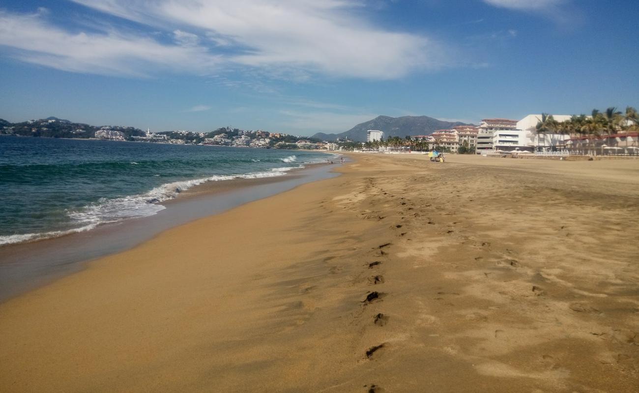 Photo de Playa Olas Altas avec sable fin marron de surface