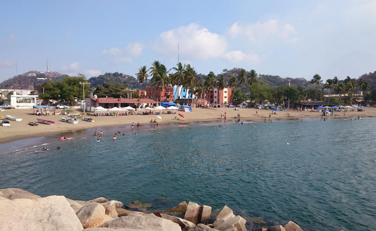 Photo de Playa San Pedrito avec sable brun de surface