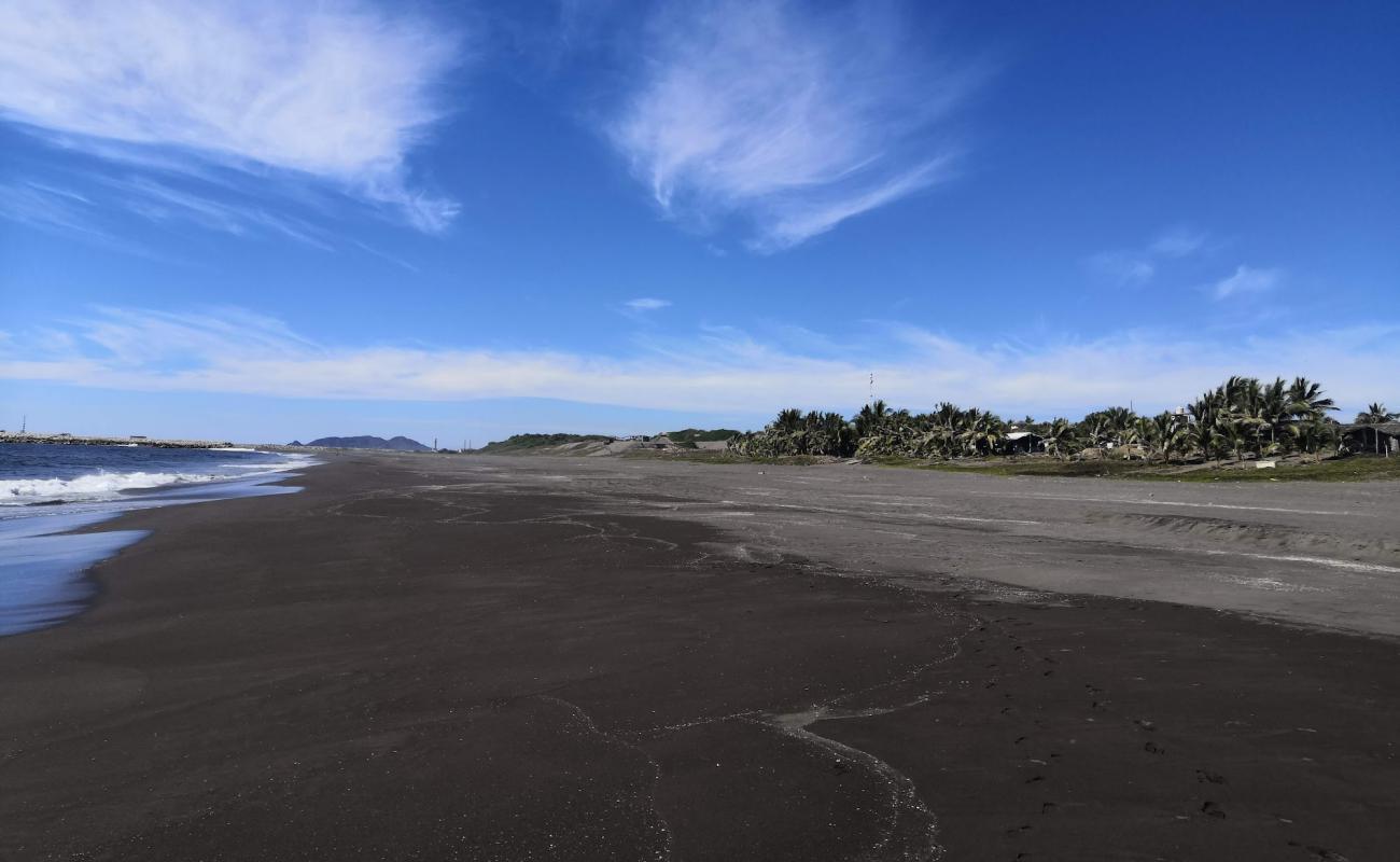 Photo de Playa "El Eden" avec sable brun de surface