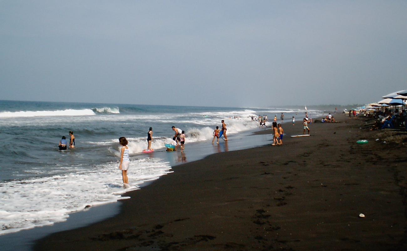 Photo de Playa de Cuyutlan avec sable brun de surface