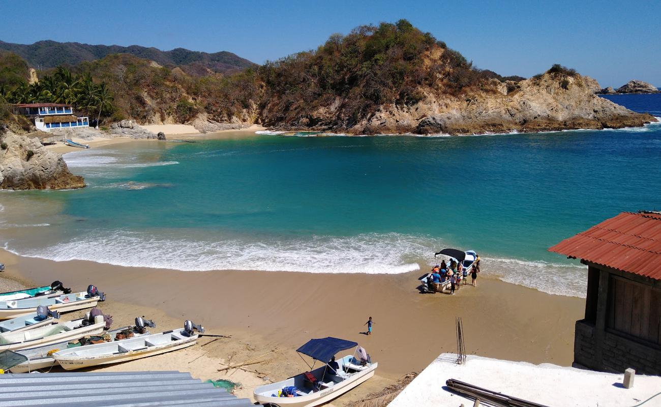 Photo de Playa Pichilinguillo avec sable beige fin de surface