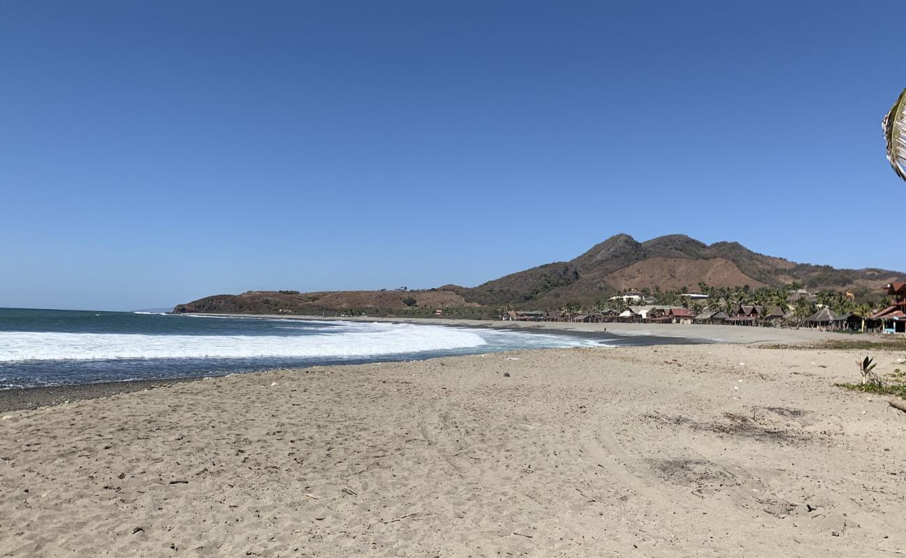 Photo de Playa Nexpa avec sable brun de surface