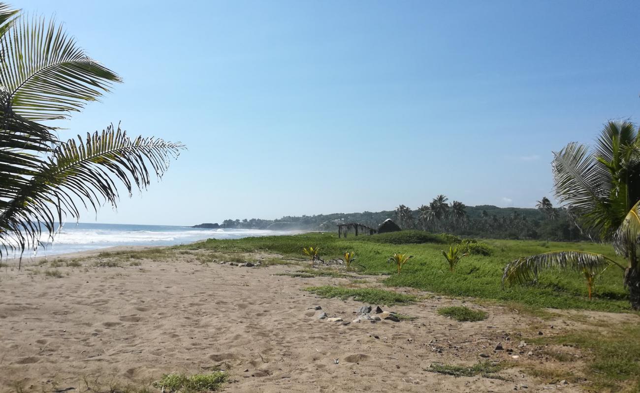 Photo de Playa Aguila avec sable brun de surface