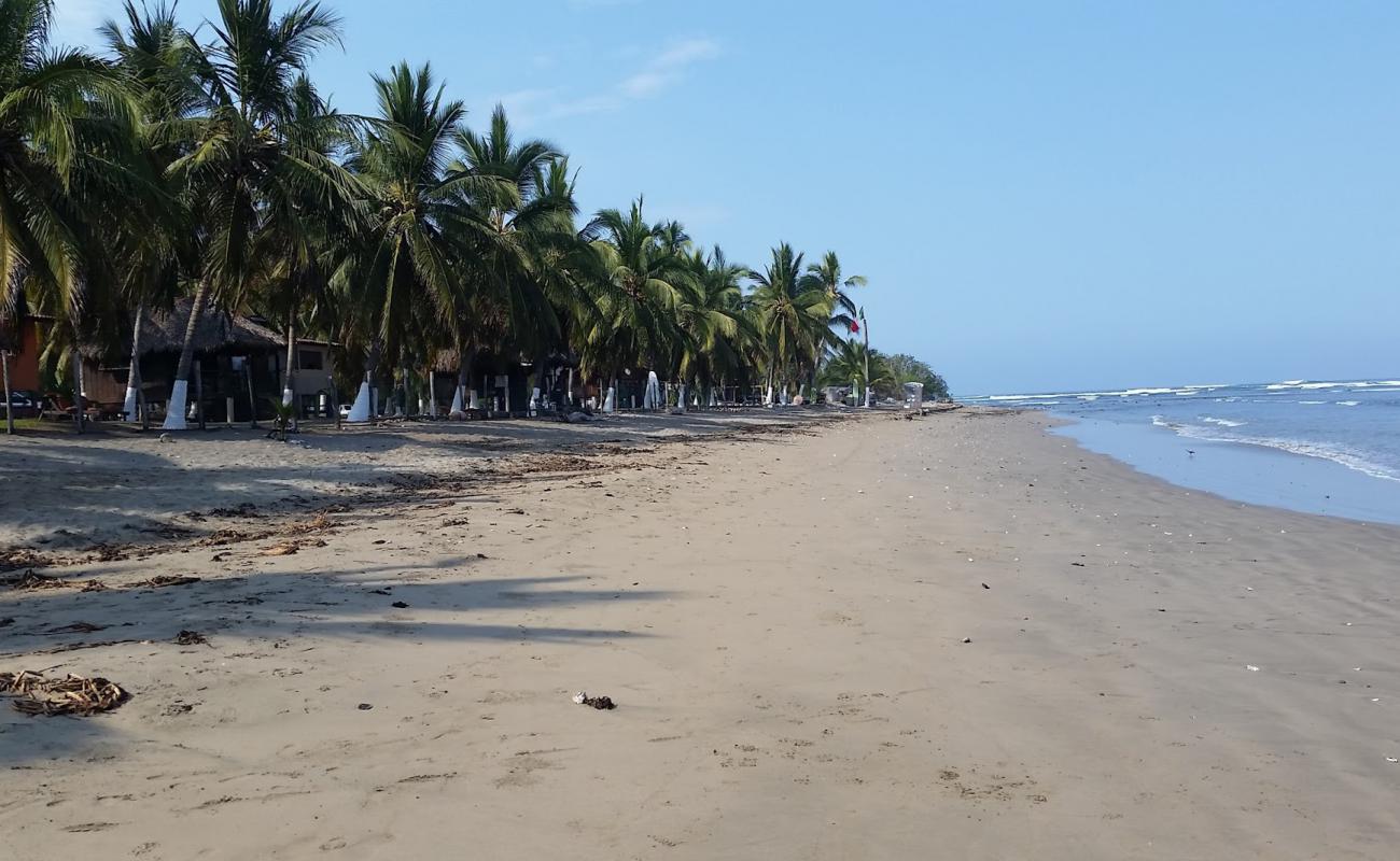 Photo de Playa La Saladita avec sable brun de surface