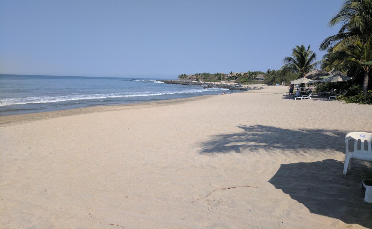 Photo de Playa Manzanillo avec sable lumineux de surface