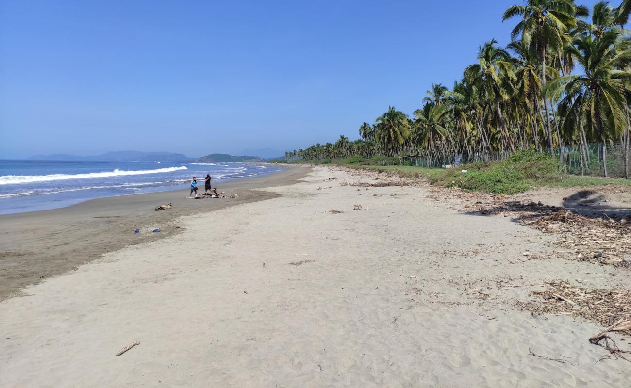 Photo de Linda Playa avec sable brun de surface