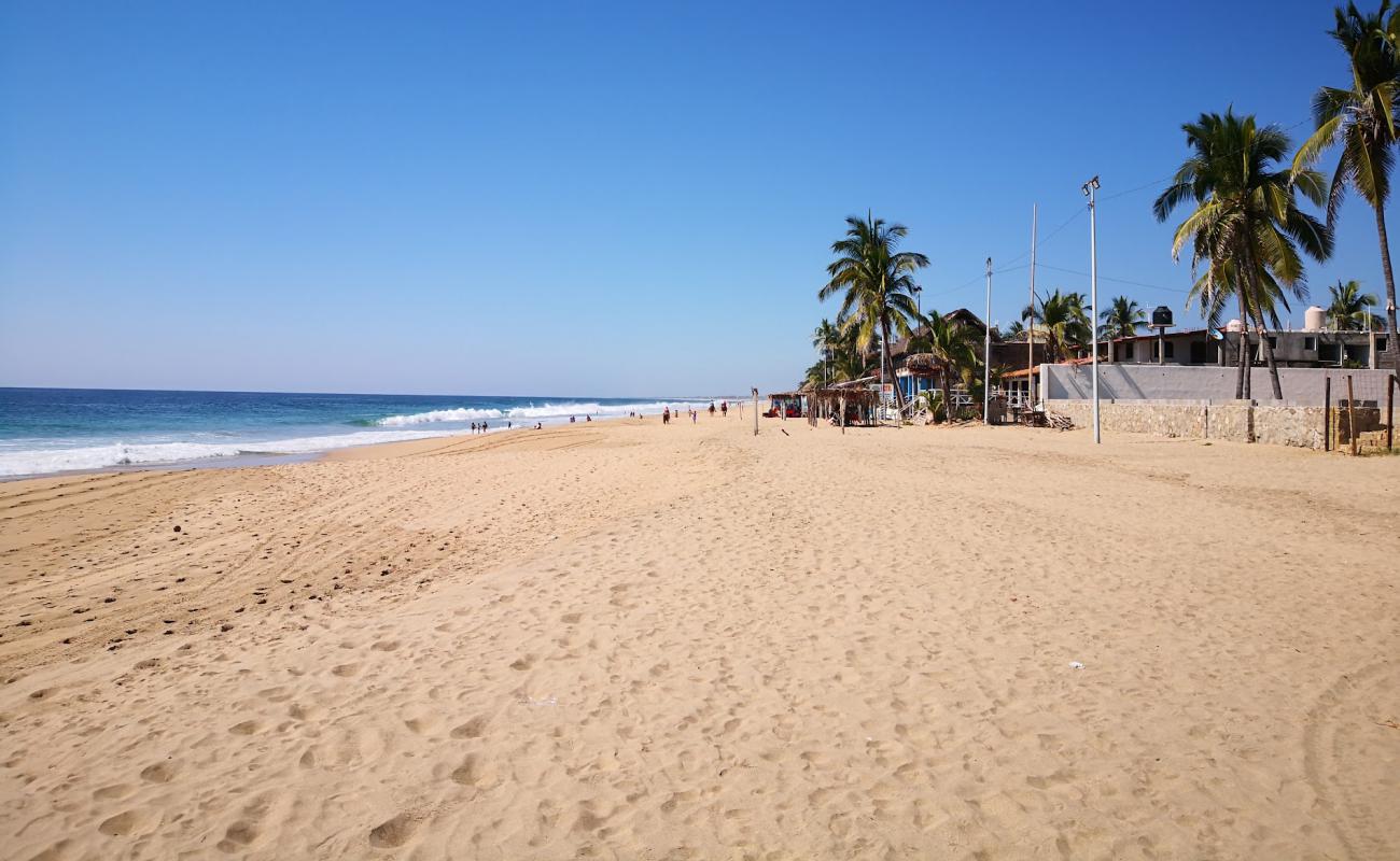 Photo de Playa Pie de La Cuesta avec sable beige de surface