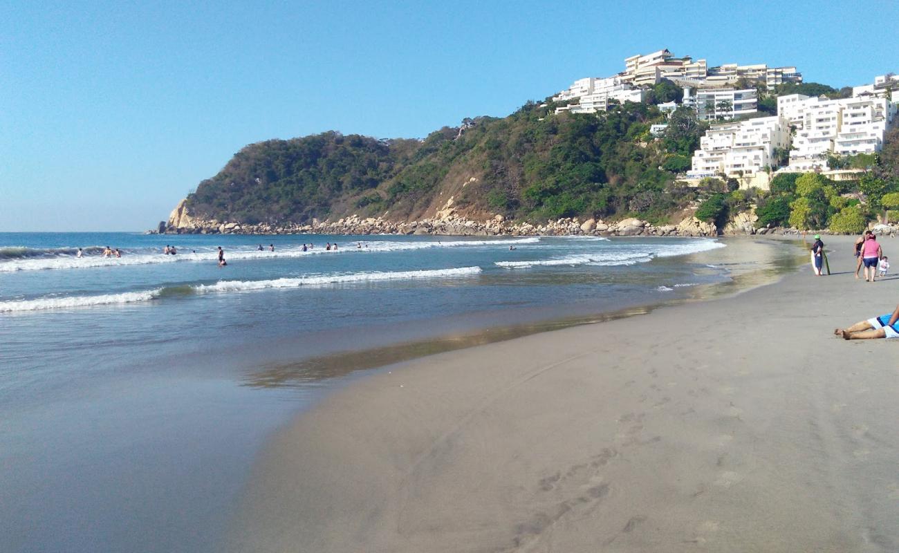 Photo de Playa Revolcadero avec sable lumineux de surface