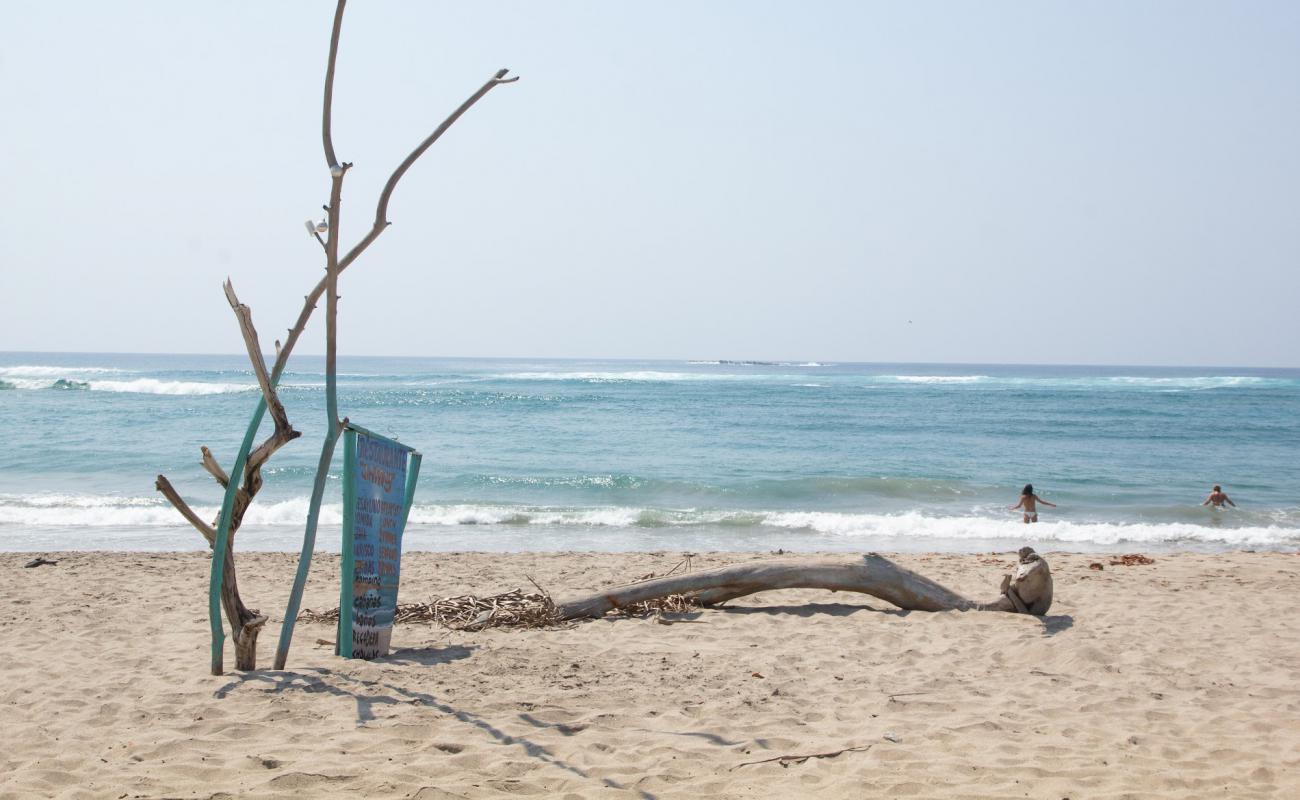 Photo de El faro de Chacahua avec sable lumineux de surface