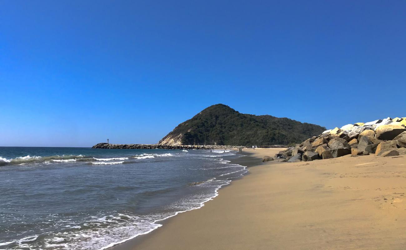 Photo de Playa Cerro Hermoso avec sable fin et lumineux de surface