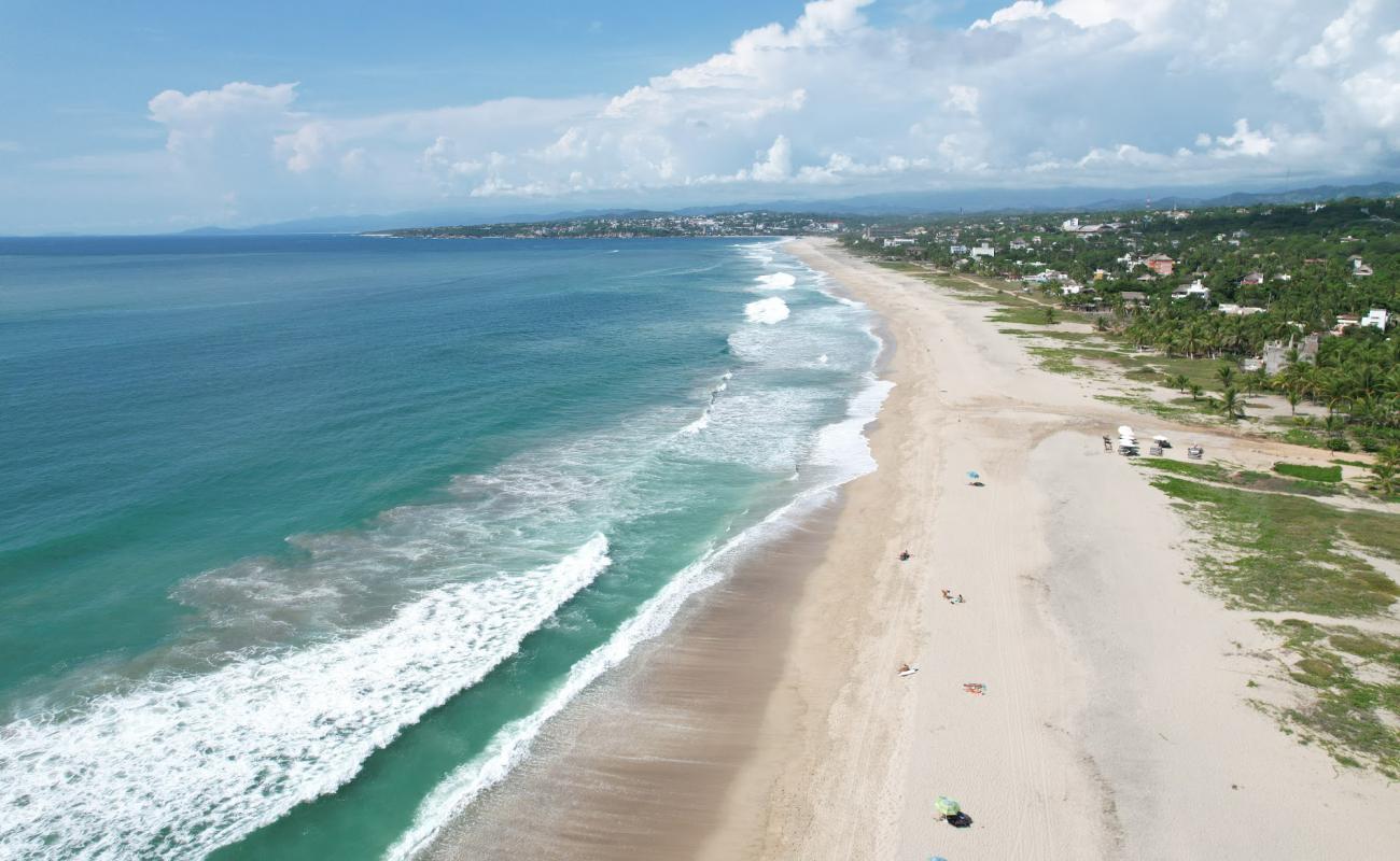 Photo de Plage de Zicatela avec sable fin et lumineux de surface