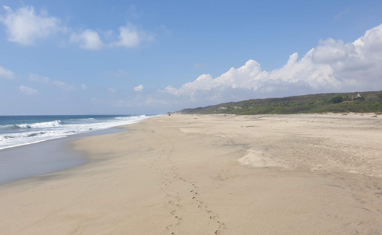 Photo de Playa Guaya avec sable fin et lumineux de surface
