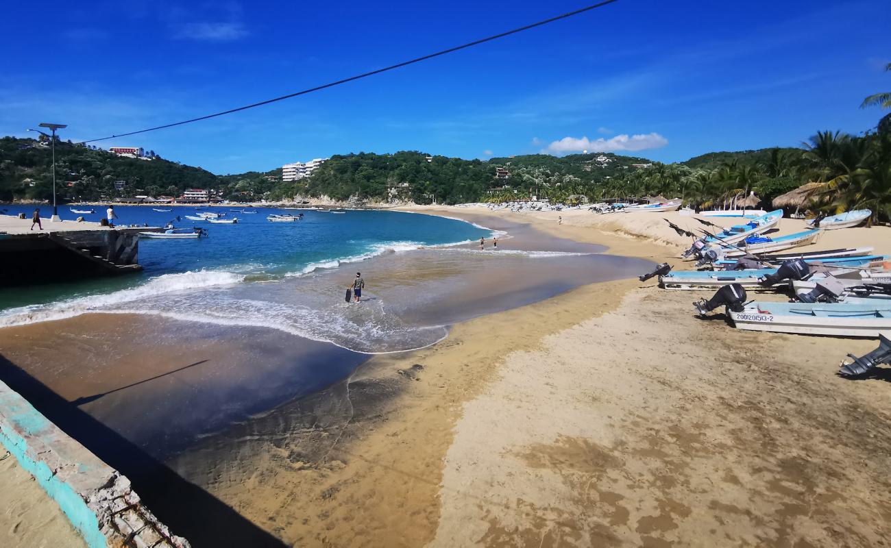 Photo de Puerto Angel avec sable beige fin de surface