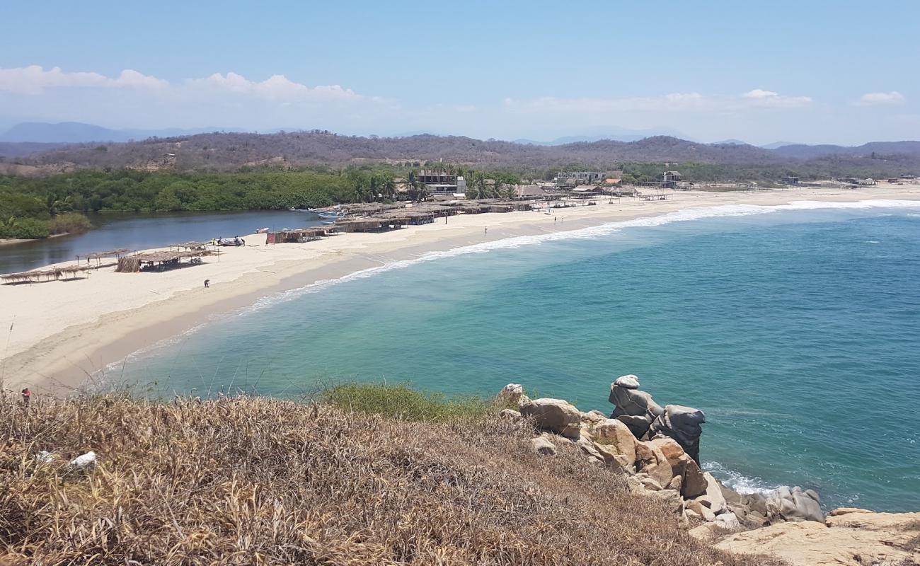 Photo de Coyula beach avec sable beige fin de surface