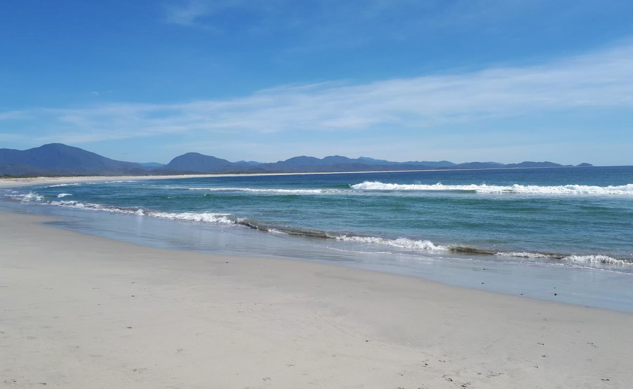 Photo de Playa Rio seco Huamelula avec sable fin et lumineux de surface