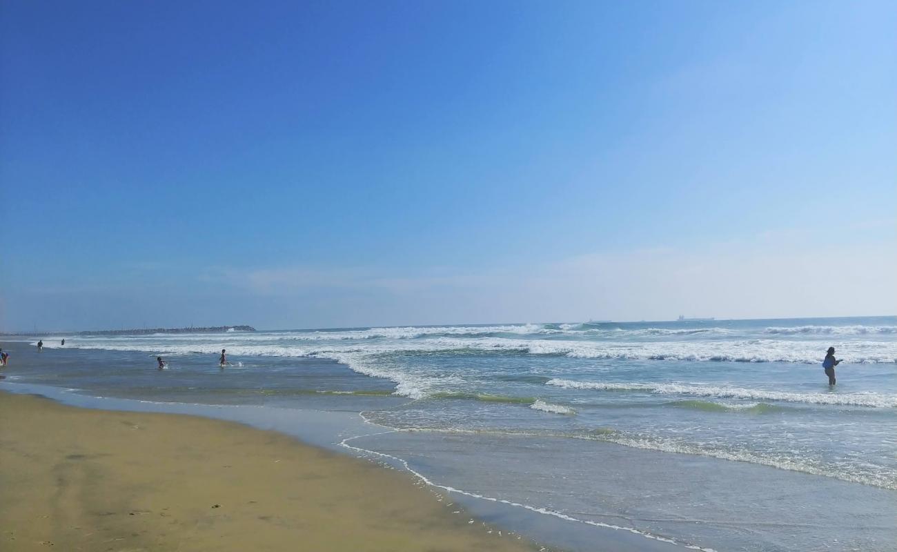 Photo de Playa Santa Monica avec sable beige de surface