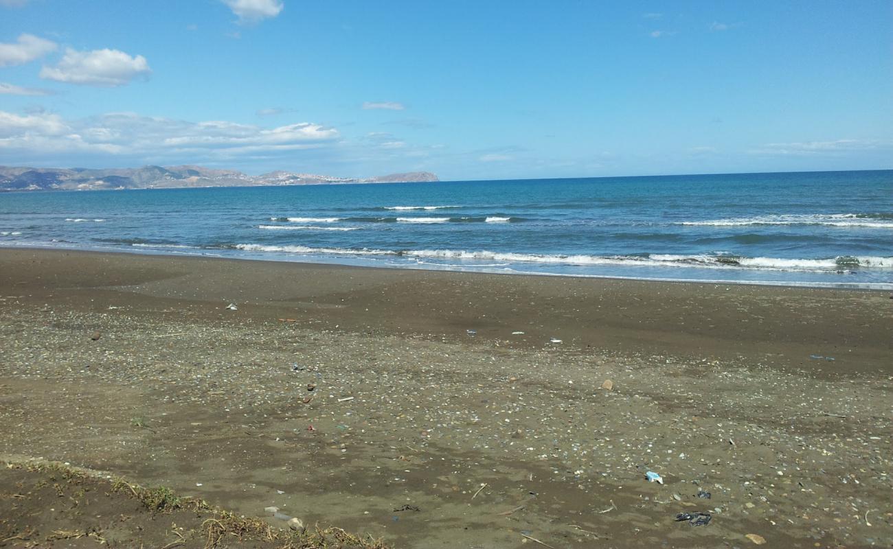 Photo de Plage Rush avec sable brun de surface