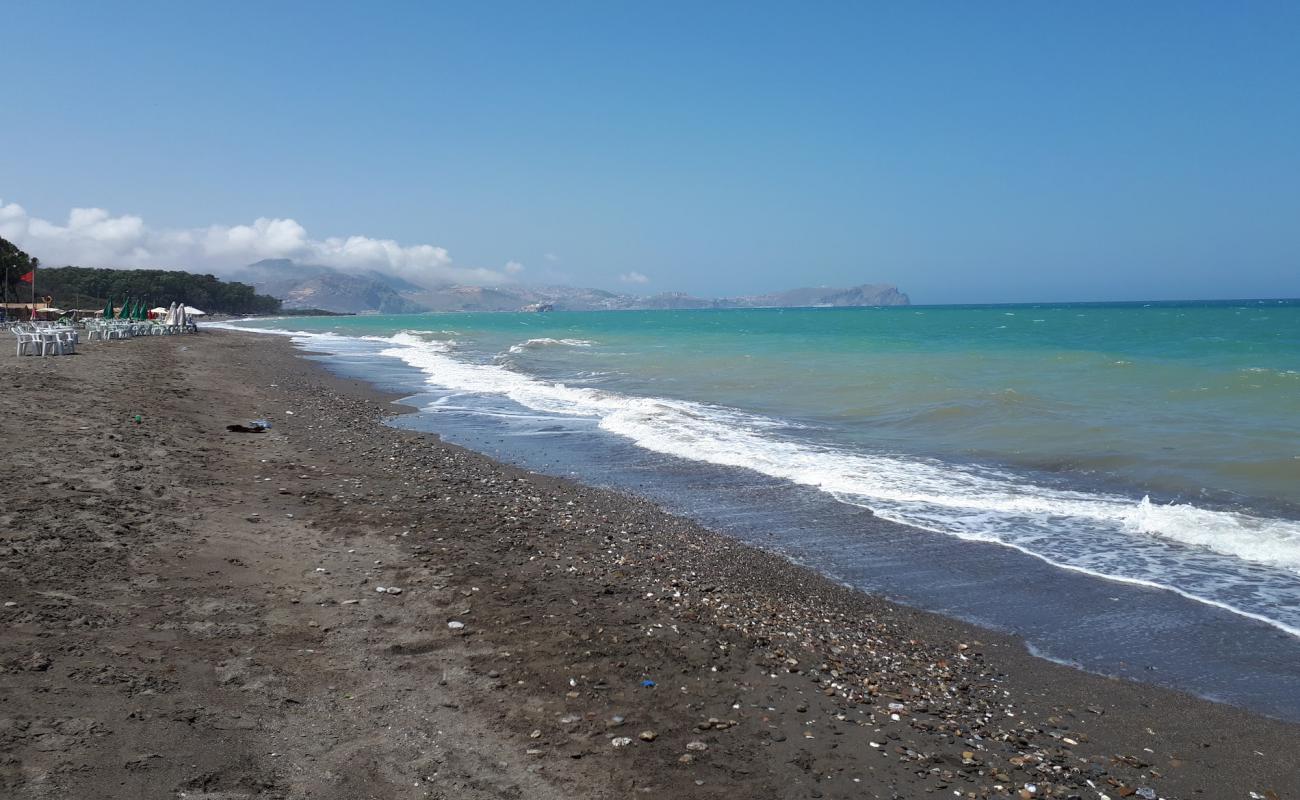 Photo de Playa del Suani avec sable gris de surface