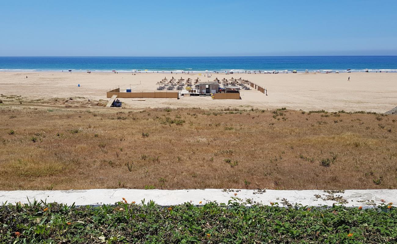 Photo de Sidi Kacem Beach avec sable fin et lumineux de surface