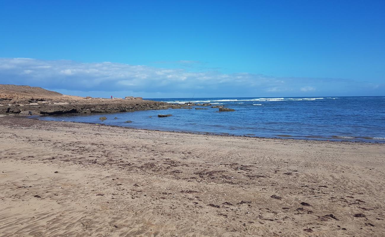 Photo de Plage Les Palmiers avec sable gris de surface