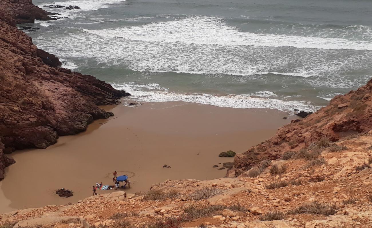 Photo de Plage tibougraychin avec sable fin et lumineux de surface