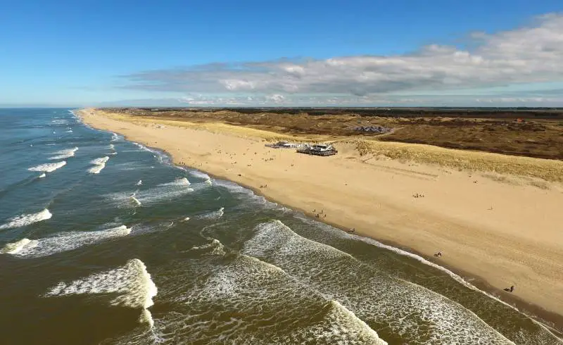 Photo de Ecomare beach avec sable lumineux de surface