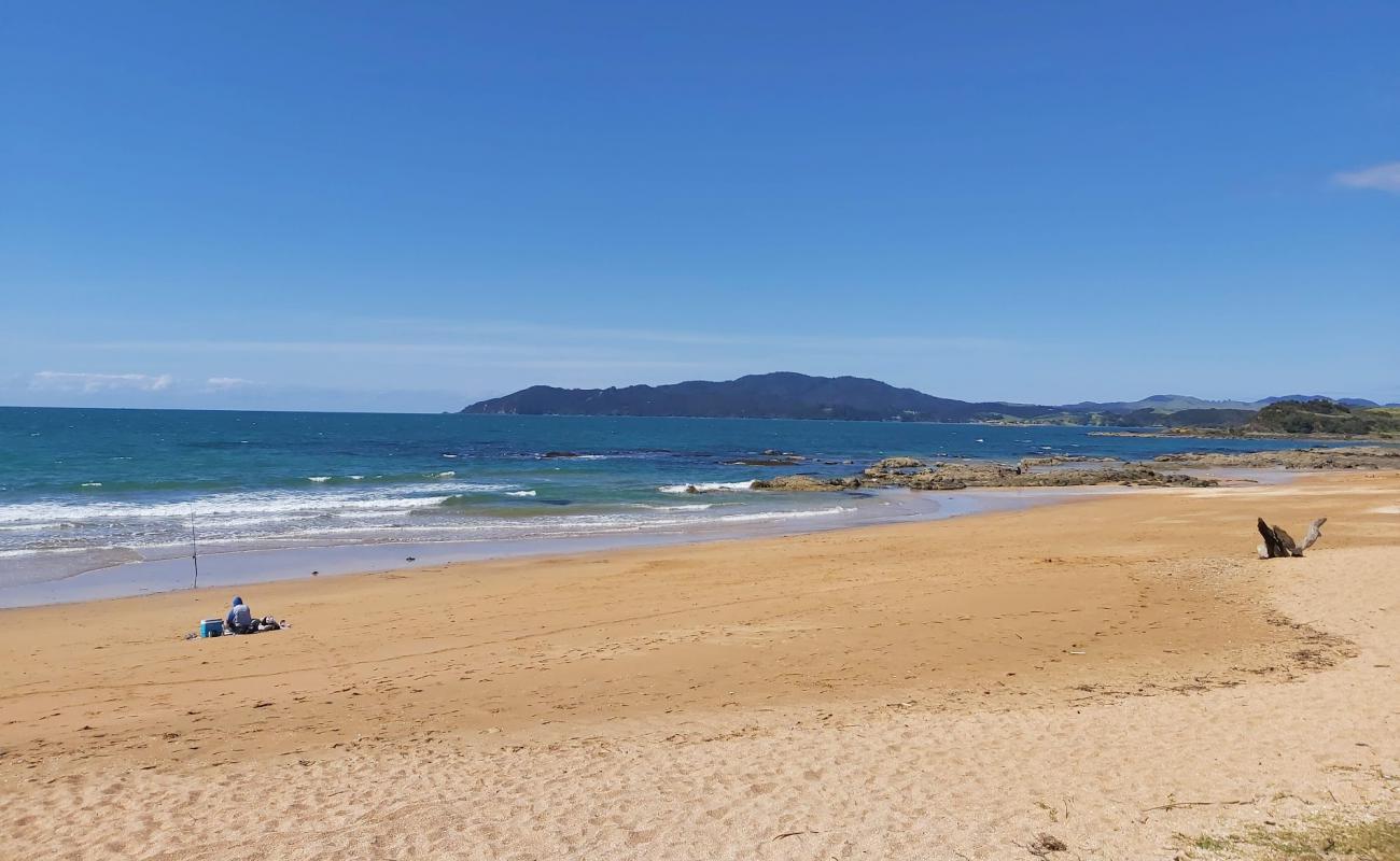 Photo de Cable Bay Beach avec sable beige de surface