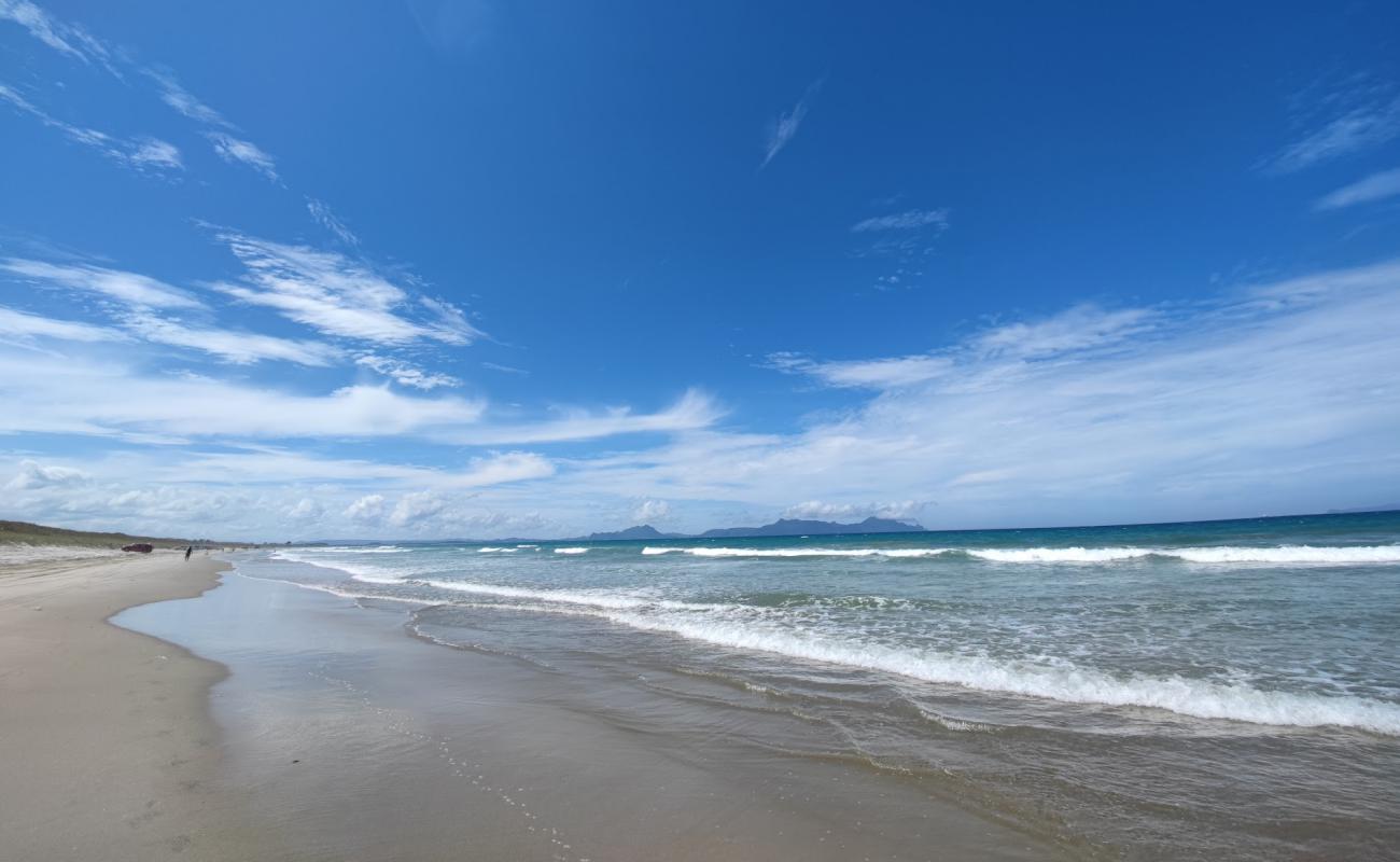 Photo de Uretiti Beach avec sable lumineux de surface