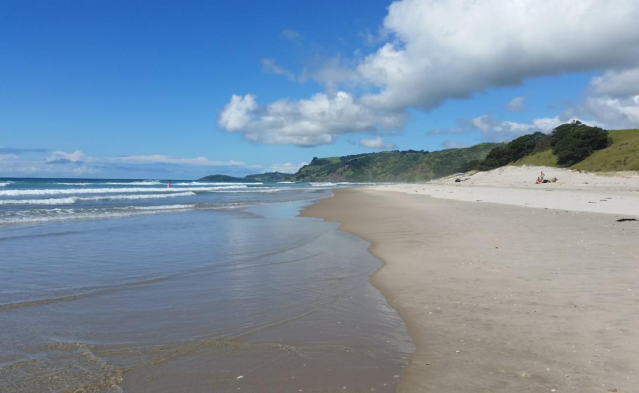 Photo de Pakiri Beach avec sable beige de surface