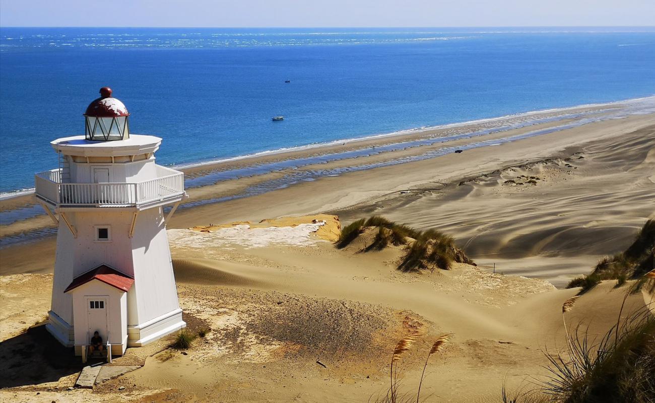 Photo de Pouto Beach avec sable beige fin de surface