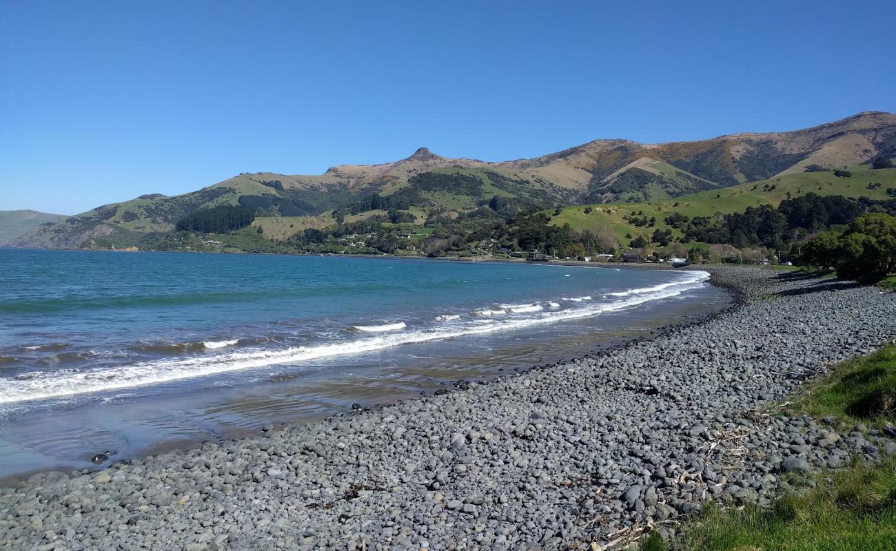 Photo de Wainui Beach avec galets gris de surface