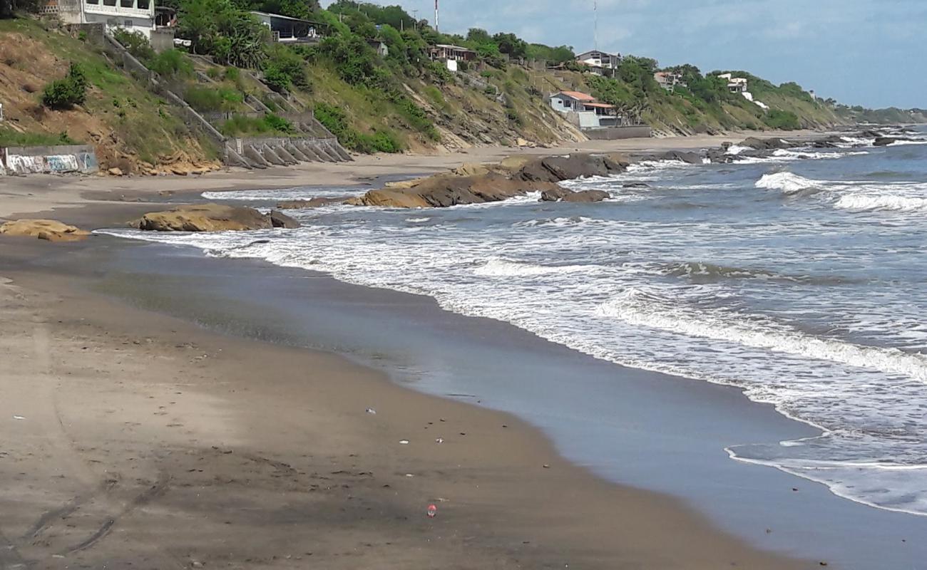 Photo de Playa La Boquita avec sable beige de surface