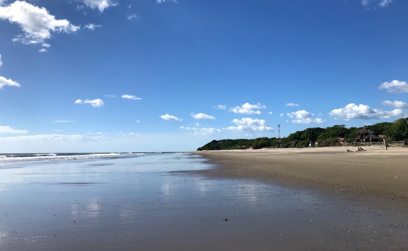 Photo de Playa Hermosa avec sable lumineux de surface