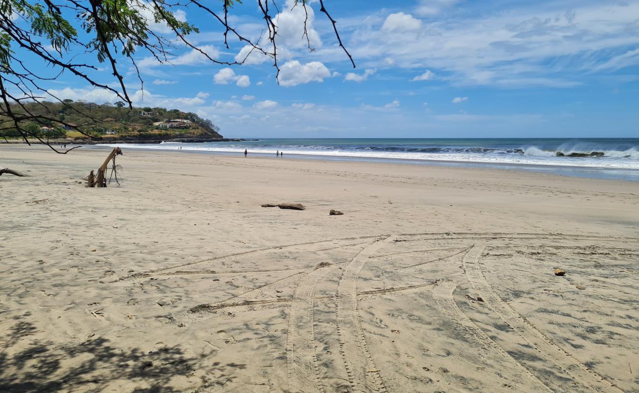 Photo de Plage de Jiquelite avec sable lumineux de surface