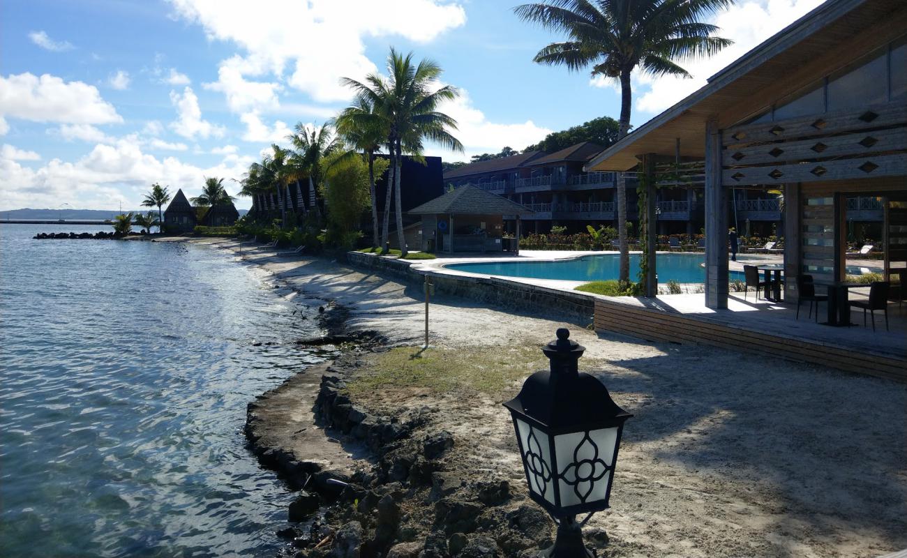 Photo de Paradise Island Resort avec sable brun avec roches de surface