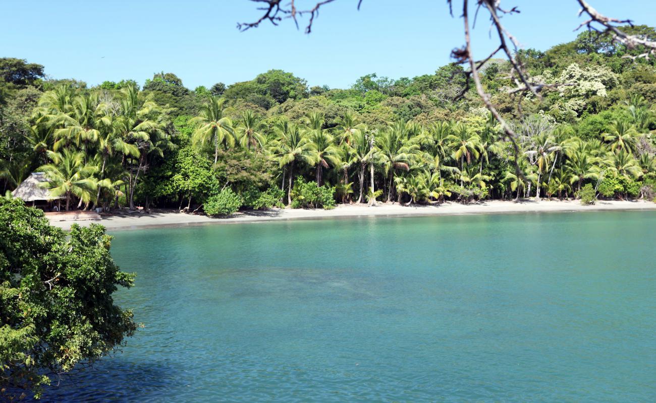 Photo de Cala Mia beach avec sable beige de surface