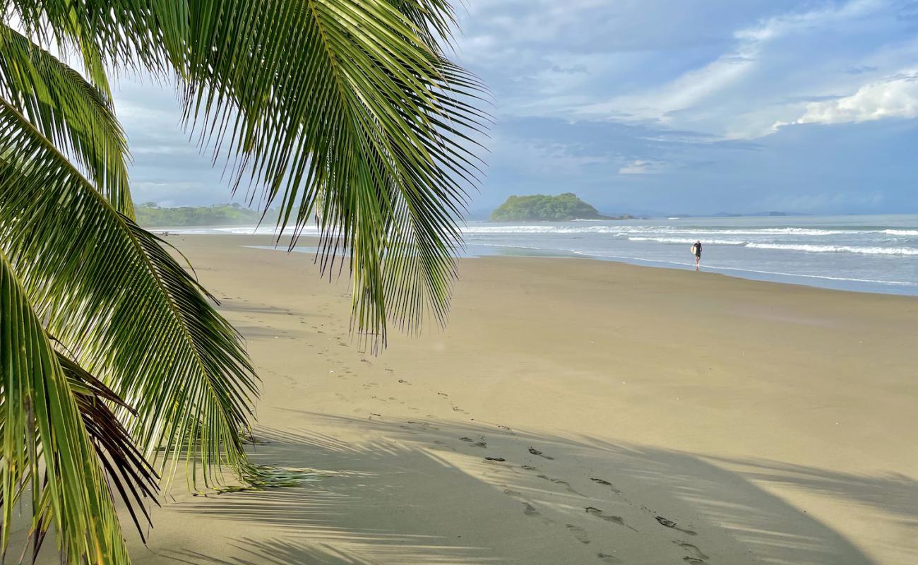 Photo de Morrillo Beach avec sable brun de surface