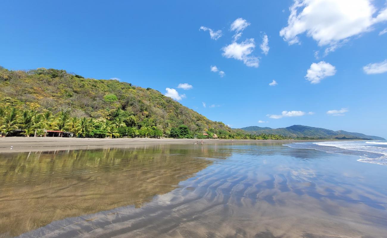 Photo de Los Buzos Beach avec sable brun de surface