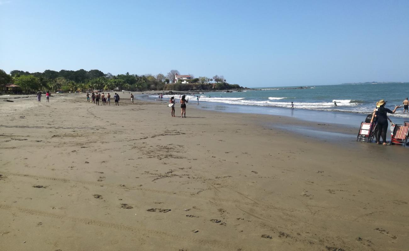 Photo de Rincon Beach avec sable brun de surface