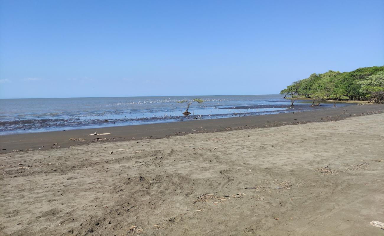 Photo de Reten Beach avec sable brun de surface